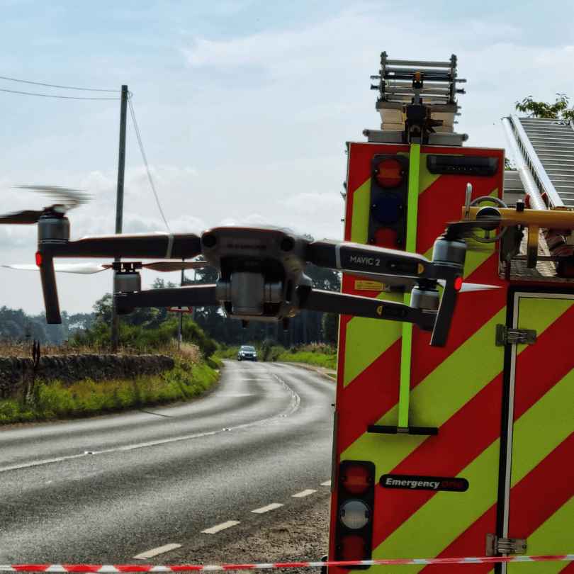 drone infront of fire service 36 11zon