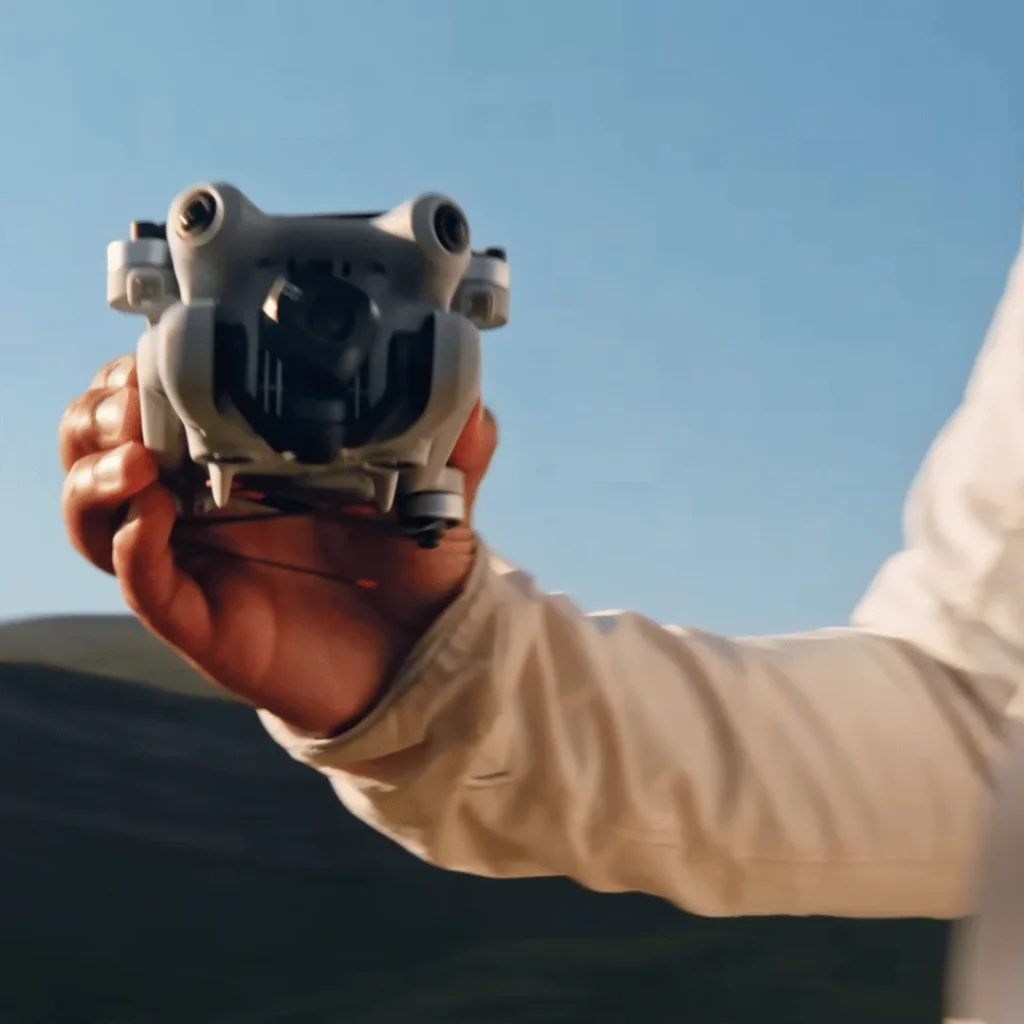 dji mini 4 pro in hand