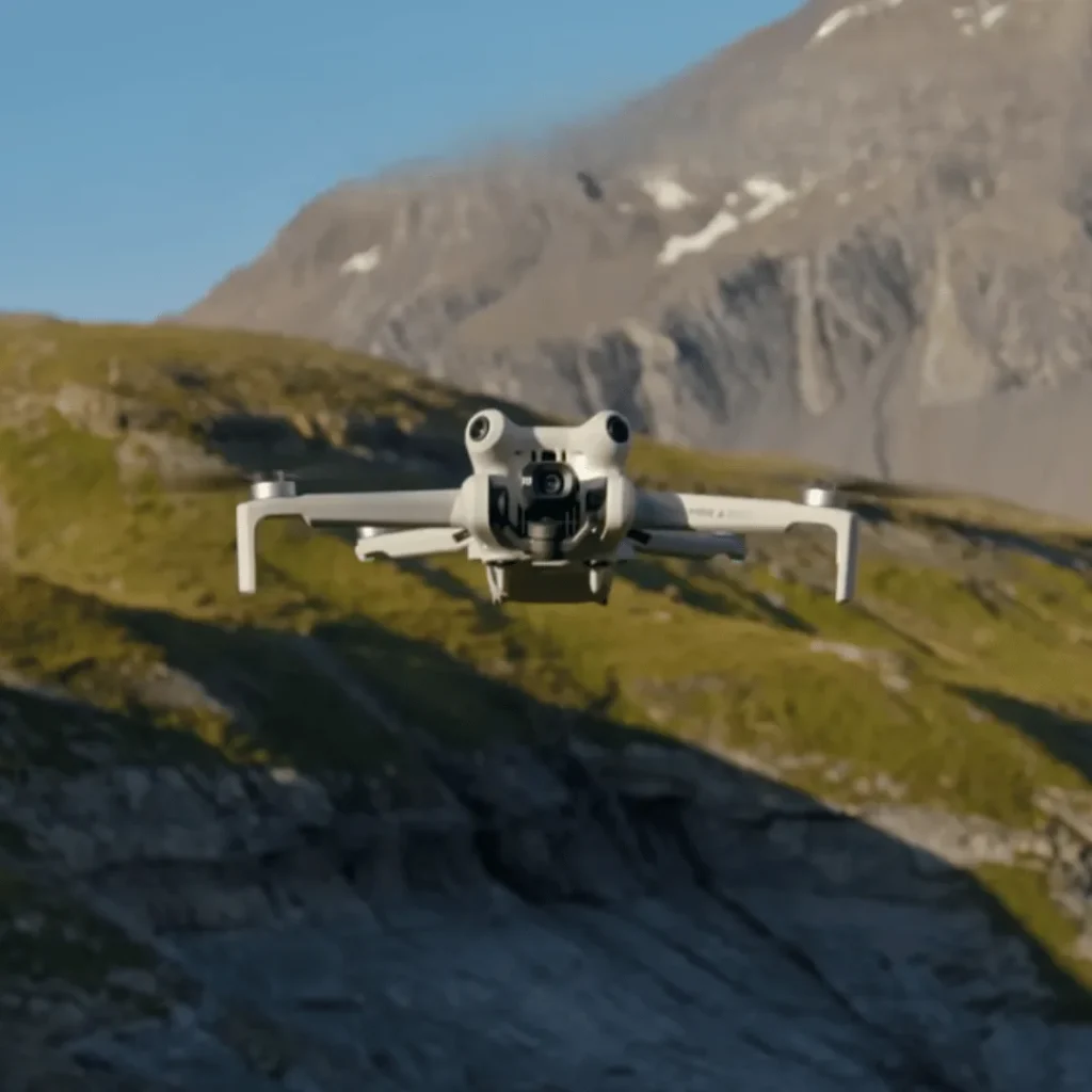 dji mini 4 pro in mountains flying in rain